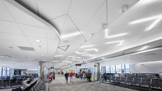 The unique new ceiling imparts a dynamic sense of movement in BWI Airport’s Concourse D. It also creates the illusion of being a higher ceiling than it is.