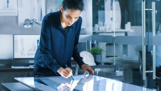 architect looking down at large interactive tablet screen