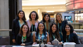 Women at a book signing at WLS 2025