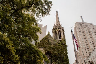 church spire among city skyline