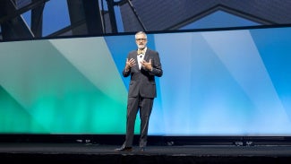 Richard Branch speaking onstage