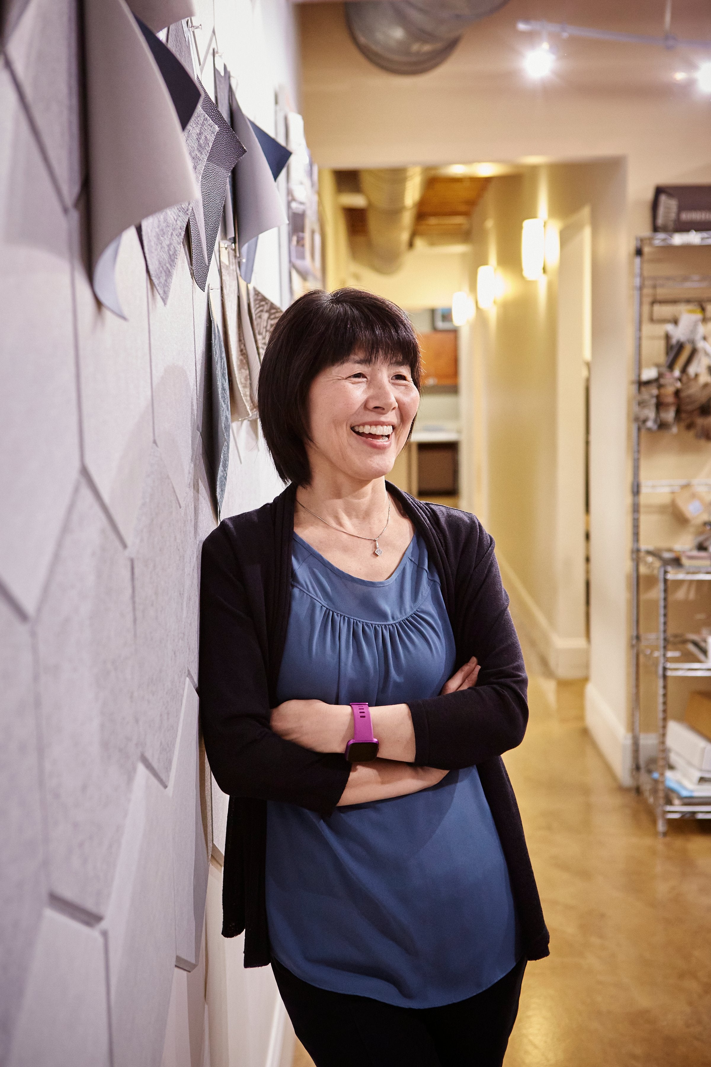 Happy AIA member in architecture studio.