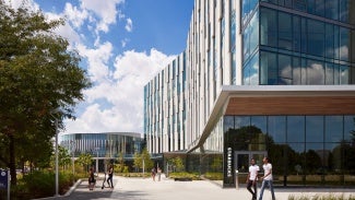 Exterior entrance of University of Illinois at Chicago, Academic and Residential Complex (UIC ARC) on a sunny day