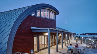 building with round roof glowing from inside