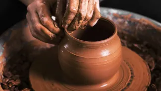 two hands pottery wheel