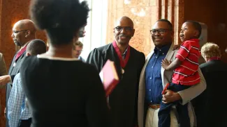 Jimmie E. Tucker, FAIA, celebrates becoming an AIA Fellow with his family during the 2019 College of Fellows Investiture Ceremony in Las Vegas.
