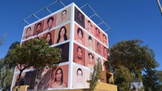 outdoor exhibit showing individuals of different ethnicities