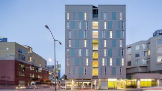 apartment building on corner of 2 streets