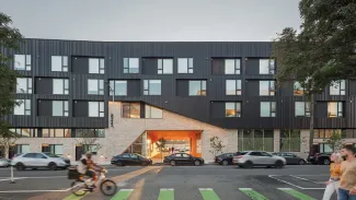 Openings break up the street wall of The Block fostering a sense of porosity across the building’s layered streetscape.