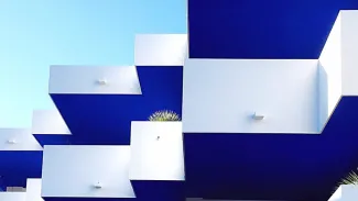 A white and blue geometric building