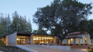 Exterior of Atherton Library at dusk.