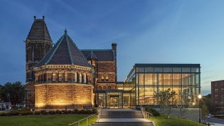 Exterior of Woburn Public Library at dusk.