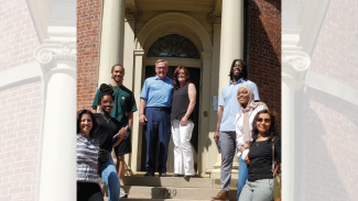 Students from AIA HBCU internship program pose in front of Octagon