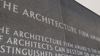 Etched wall at AIA headquarters with names of Firm Award winners