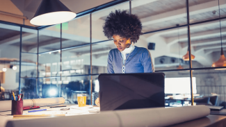 architect working a table with laptop in a modern office