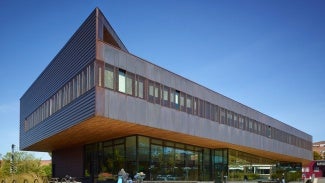 The upper level houses the offices for the franklin regional transit authority and the franklin regional council of governments. the design optimizes massing, material selections, and on-site renewable energy.