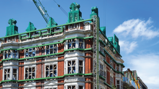 Scaffolding on shell facade of old Victorian palace near Green Park in London, England