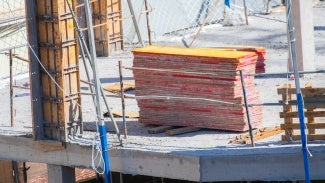 Work material in the construction of a building