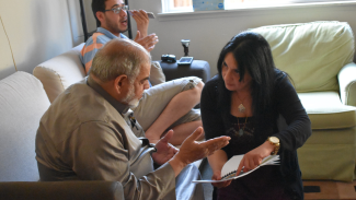 Rania with a Syrian refugee