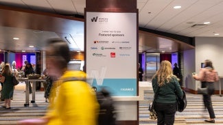 Sign highlighting sponsors at a conference