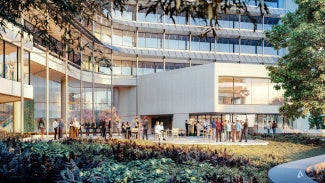 Crowd enjoying a beautiful event on the patio of the AIA Global Campus
