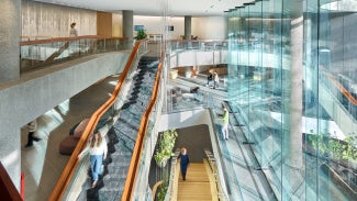 Sun shining through glass windows at AIA Global Campus