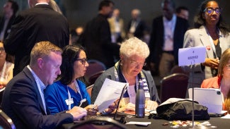 Leaders at the 2025 business meeting