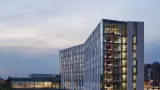 Exterior of University of Illinois at Chicago, Academic and Residential Complex (UIC ARC) at sunset.