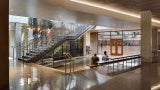 Lubber Run Community Center GYMNASIUM CONCRETE LOBBY WITH STAIR TO UPPER LEVEL
