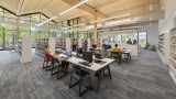 Southwest Public Library in Washington, DC interior view of book shelves and workspaces