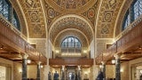 Beaux arts style great hall with gold detail at the National Academy of Sciences Headquarters.