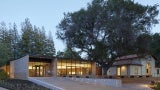 Exterior of Atherton Library at dusk.