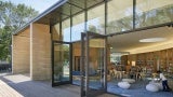 Exterior entrance of Atherton Library with doors open.