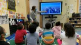 CAROLINE TEACHING IN A BOSTON PUBLIC SCHOOLS KINDERGARTEN AS A VOLUNTEER THROUGH THE BOSTON SOCIETY FOR ARCHITECTURE.