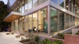 Exterior view of building lobby with large glass windows