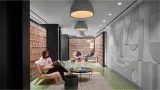 Three people reading at Convene Events Center At Willis Tower, Chicago
