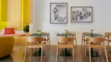 Small table seating inside of Liberation Coffee House 