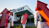 Exterior of Mini Mart City Park with people in the foreground