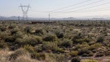 Exterior of Pima Dynamite Trailhead from far away on a sunny day. 