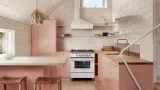 Pink kitchen inside of The Perch 