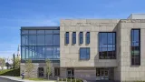 Rear exterior of Woburn Public Library on a sunny day.