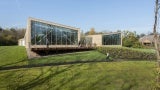 Outside of building with floor to ceiling windows