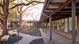 covered porch area with courtyard