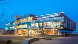 Exterior of a science building at night. 