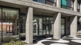 Entrance with concrete sidewalk pattern derived from Rio de Janeiro
