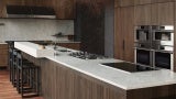 An expansive island in the center of The Professional Kitchen