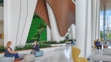 As guests enter the dining commons, large mural photographs of Native American life mark individual seating areas throughout the space.