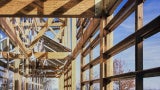 Philip Merrill Environmental Center: Daylighting is maximized by the narrow building depth and expansive south glazing, controlled through deep overhangs and a fixed bris-soleil. 