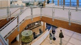 Philip Merrill Environmental Center: View of the lobby stairs that connect the first-floor entry and exhibit space to the  second floor staff work area. 