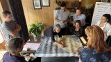 Architects around a table providing disaster assistance